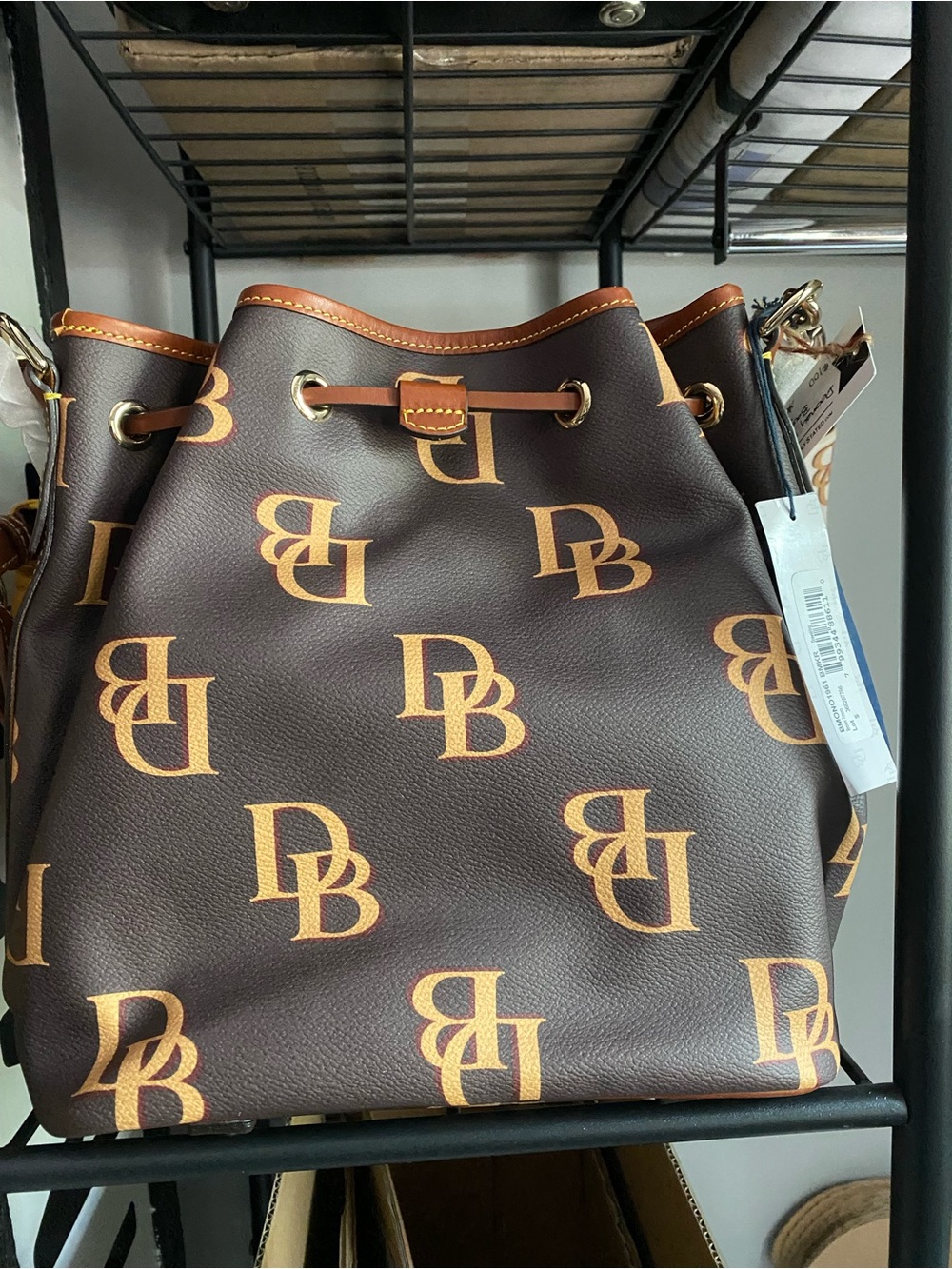 Dooney & Bourke Brown and Tan Logo Drawstring Shoulder Bag